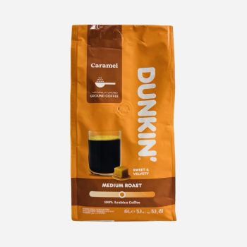 Dunkin' caramel-flavored ground coffee bag, medium roast, orange packaging with a glass of black coffee and caramel cube image on the front, 450 g