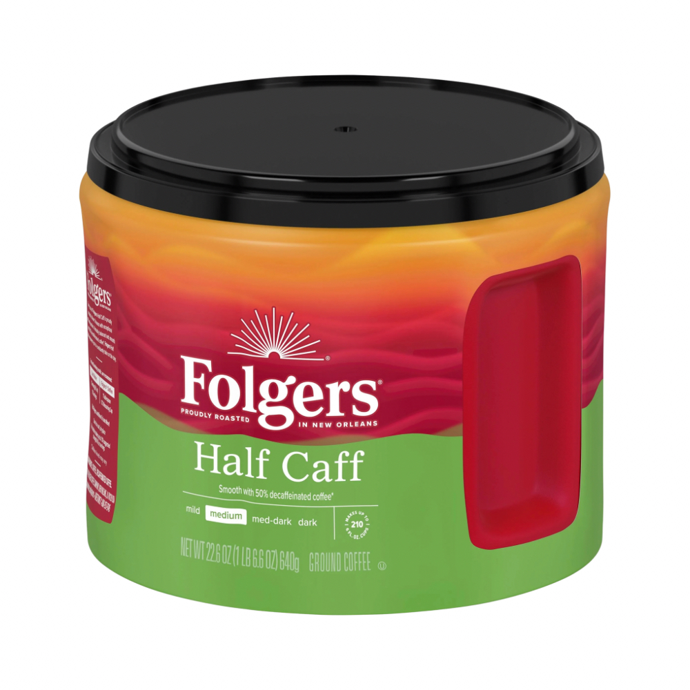 Folgers Half Caff 640g - AVANZA - Coffee House Folgers Half Caff ground coffee can with a red mug graphic on a green and orange label, black lid visible.