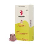 Hausbrandt Colombia coffee capsules box with a single pink-brown capsule beside it, yellow and white packaging.