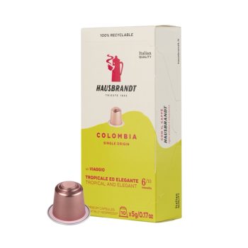 Hausbrandt Colombia coffee capsules box with a single pink-brown capsule beside it, yellow and white packaging.