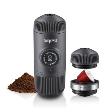 Nanopresso portable espresso maker with ground coffee to the side and an open capsule pod next to it on a white background.