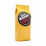 Yellow bag of Caffè Vergnano 1882 Riserva Torino 100% Arabica coffee beans with bold round logo on the front.