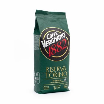 Green coffee bag labeled Caffè Vergnano 1882, Riserva Torino, Nobile, smooth & balanced, 1 kg net weight.
